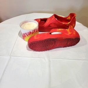 Croc sandals pink and yellow in color...